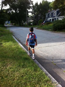 My big guy walking to the bus stop on his first day of kindergarten. 